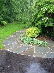 flagstone pavers with river rock