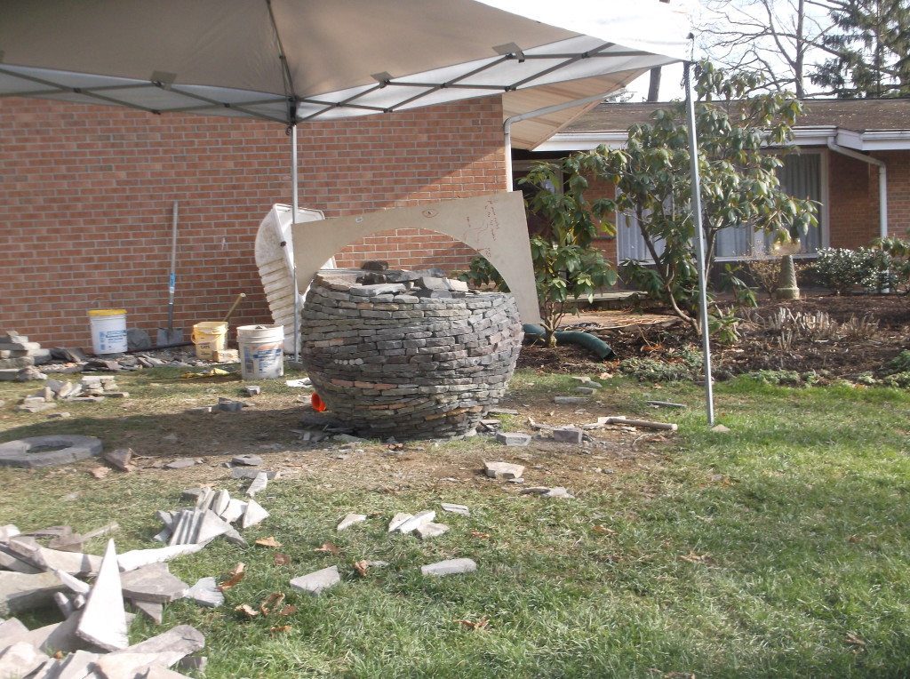 building a dry stone sphere garden sculpture