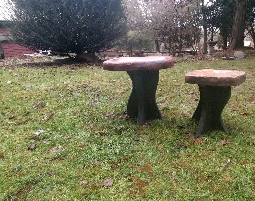 pair of hand-carved bird baths