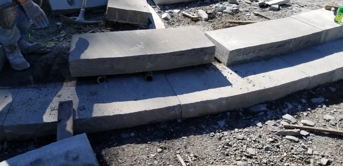 using rollers to move stone