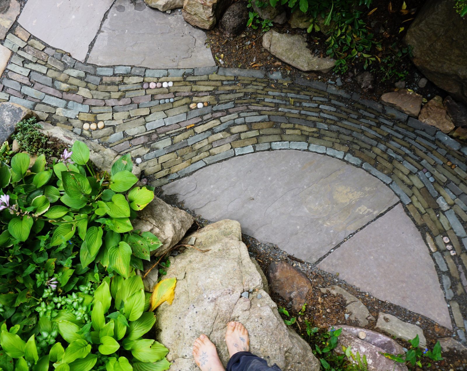 https://www.devineescapes.com/wp-content/uploads/2023/08/mosaic-stone-path-stone-art-2-scaled.jpg