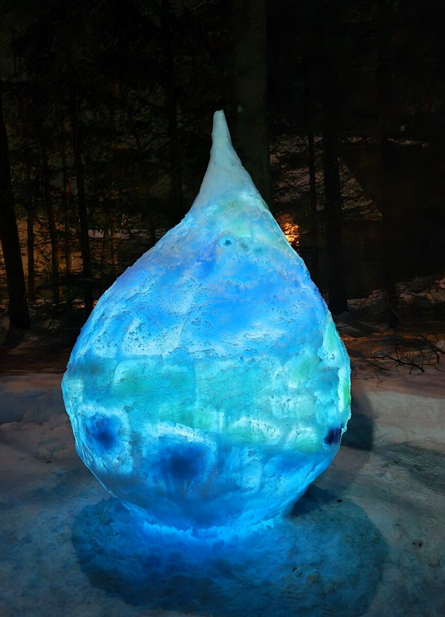 blue ice sculpture illuminated 