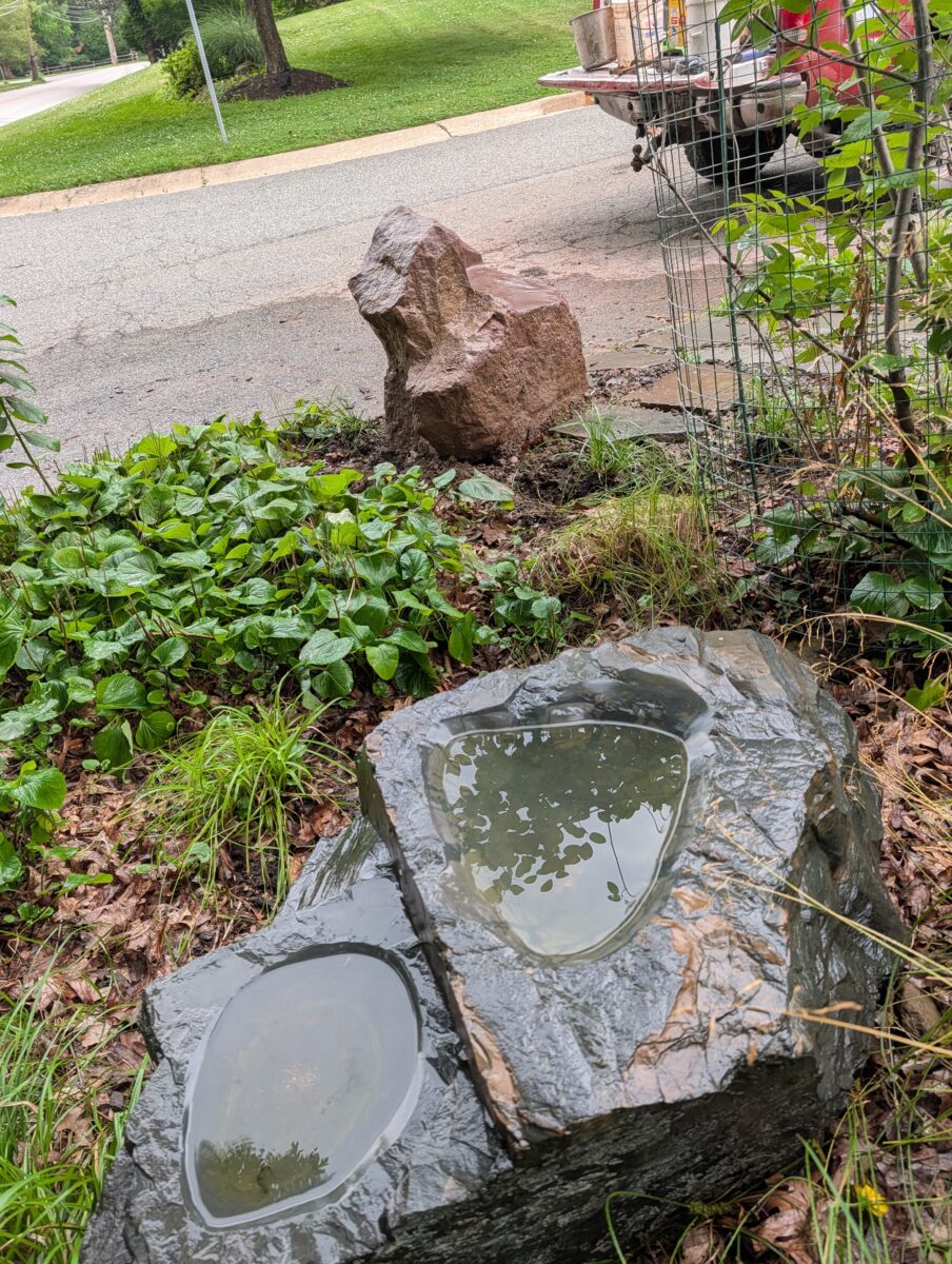 bird bath and boulder chair both functional stone carvings