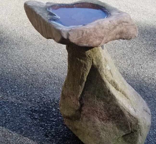 stone carving bird bath