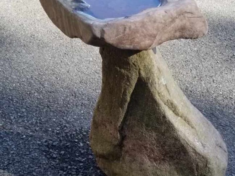 stone carving bird bath